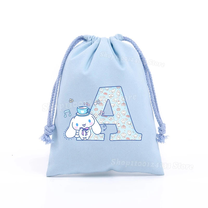 Simpatica borsa con coulisse per ragazza Cinnamoroll Sanrio Lettera Anime AZ Stampa portatile per bambini Kawaii Festa di compleanno Tasca a mano Giocattolo Custodia regalo
