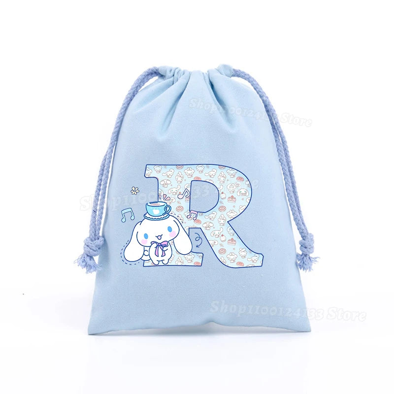 Simpatica borsa con coulisse per ragazza Cinnamoroll Sanrio Lettera Anime AZ Stampa portatile per bambini Kawaii Festa di compleanno Tasca a mano Giocattolo Custodia regalo