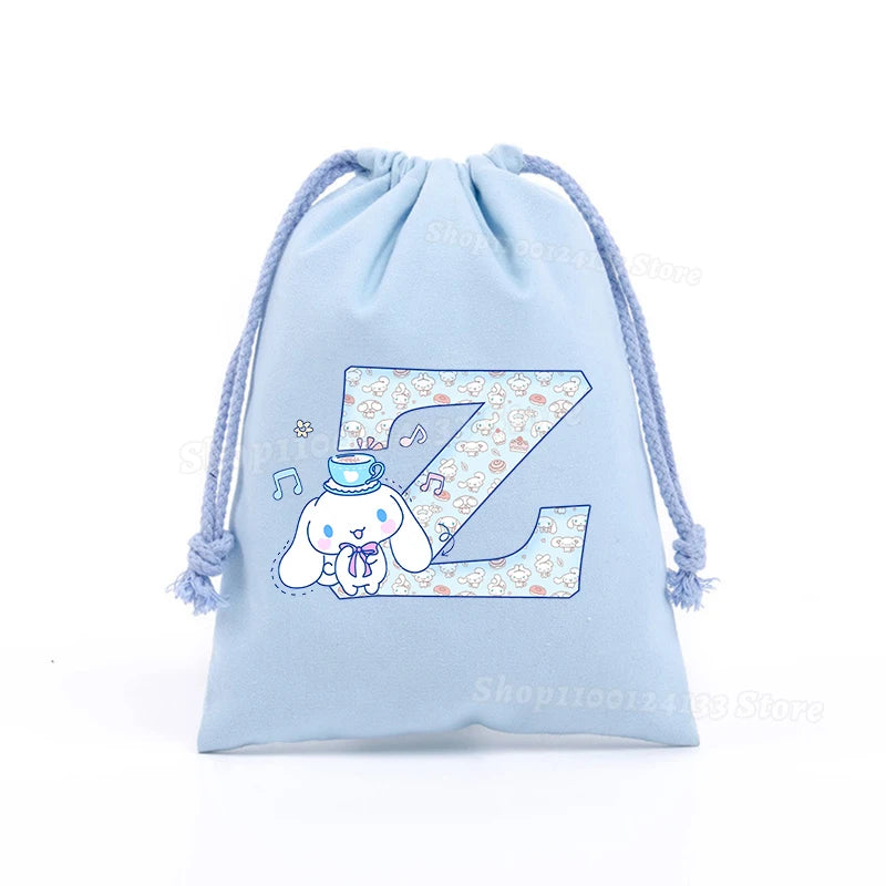 Simpatica borsa con coulisse per ragazza Cinnamoroll Sanrio Lettera Anime AZ Stampa portatile per bambini Kawaii Festa di compleanno Tasca a mano Giocattolo Custodia regalo