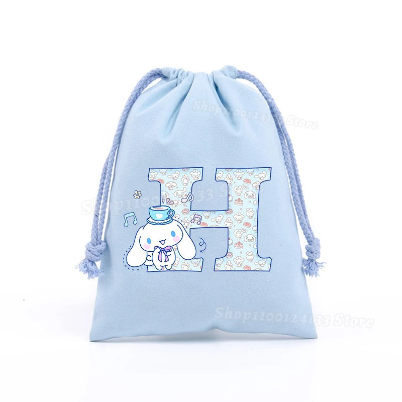 Simpatica borsa con coulisse per ragazza Cinnamoroll Sanrio Lettera Anime AZ Stampa portatile per bambini Kawaii Festa di compleanno Tasca a mano Giocattolo Custodia regalo