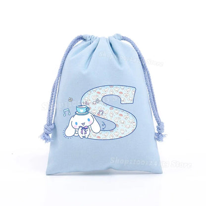 Simpatica borsa con coulisse per ragazza Cinnamoroll Sanrio Lettera Anime AZ Stampa portatile per bambini Kawaii Festa di compleanno Tasca a mano Giocattolo Custodia regalo