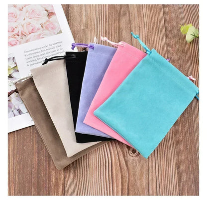 Simpatica borsa con coulisse per ragazza Cinnamoroll Sanrio Lettera Anime AZ Stampa portatile per bambini Kawaii Festa di compleanno Tasca a mano Giocattolo Custodia regalo