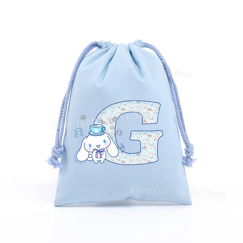 Simpatica borsa con coulisse per ragazza Cinnamoroll Sanrio Lettera Anime AZ Stampa portatile per bambini Kawaii Festa di compleanno Tasca a mano Giocattolo Custodia regalo