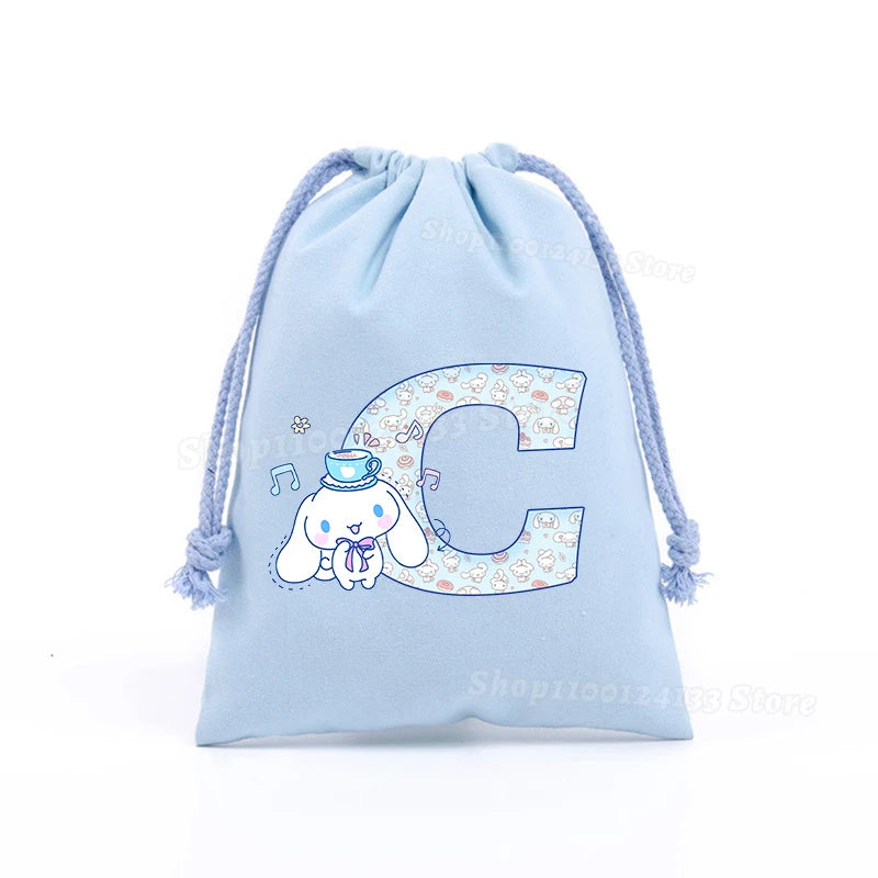 Simpatica borsa con coulisse per ragazza Cinnamoroll Sanrio Lettera Anime AZ Stampa portatile per bambini Kawaii Festa di compleanno Tasca a mano Giocattolo Custodia regalo