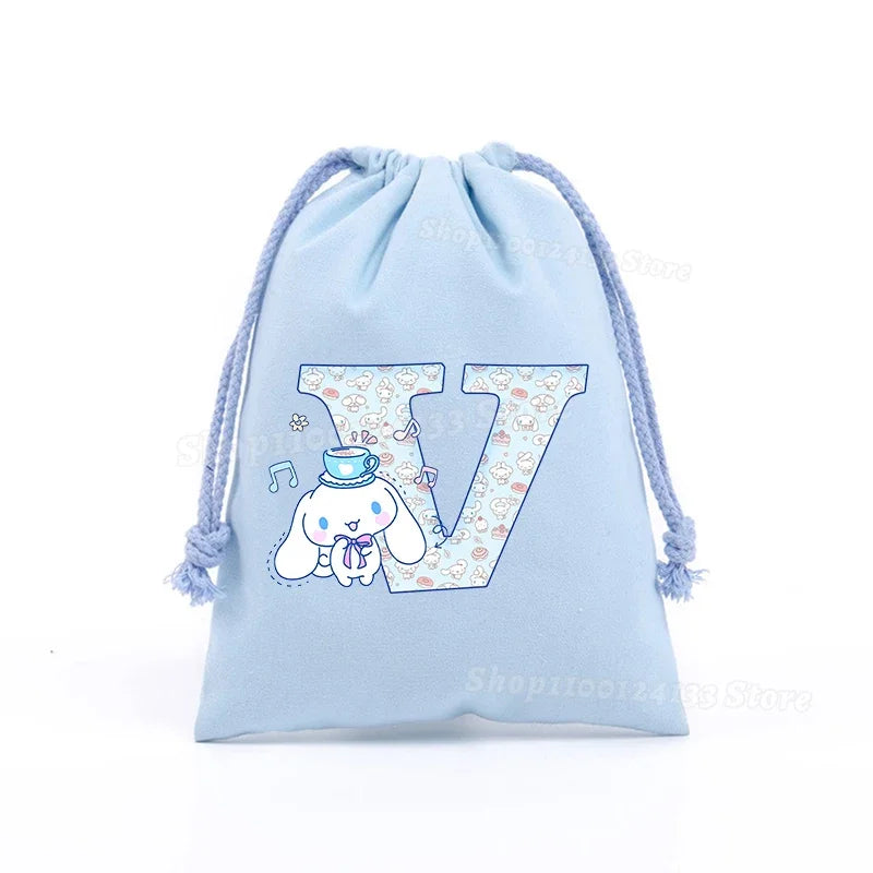 Simpatica borsa con coulisse per ragazza Cinnamoroll Sanrio Lettera Anime AZ Stampa portatile per bambini Kawaii Festa di compleanno Tasca a mano Giocattolo Custodia regalo